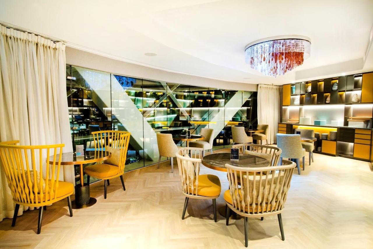 Andaz Capital Gate Abu Dhabi, By Hyatt Hotel Kültér fotó The interior of the restaurant